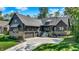 Charming two-story home boasts a three-car garage, beautiful brick accents, and inviting curb appeal at 907 Oak Terrace Rd, Westfield, IN 46074