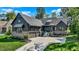 Beautiful home featuring a three-car garage, brick accents, professional landscaping, and a welcoming entrance at 907 Oak Terrace Rd, Westfield, IN 46074