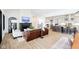 This home features an open concept living area with a fireplace and views into the kitchen at 907 Oak Terrace Rd, Westfield, IN 46074