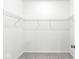 An empty closet with installed shelving, ready to organize your wardrobe at 9442 Orchard Cove Dr, Indianapolis, IN 46239