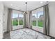Bright dining area with large windows offering scenic views at 9442 Orchard Cove Dr, Indianapolis, IN 46239
