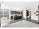 Open-concept kitchen featuring stainless steel appliances and granite counters at 9442 Orchard Cove Dr, Indianapolis, IN 46239