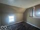 This bedroom features a window that provides natural light, and the room has a unique layout at 959 E Georgia St, Indianapolis, IN 46202