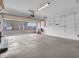 Spacious two car garage with storage shelves at 9657 Rialto Trl, Carmel, IN 46280