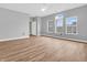 Bright main bedroom with large windows, a ceiling fan, and a neutral color scheme at 9657 Rialto Trl, Carmel, IN 46280