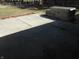 Concrete patio with a stone barbeque on an early spring day at 10128 E Troy Ave, Indianapolis, IN 46239