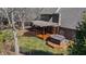 Aerial view of the deck and backyard, complete with hot tub and pergola feature at 1110 Butternut Dr, Columbus, IN 47201