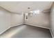 Unfinished basement, featuring carpeting and egress window providing natural light at 1110 Butternut Dr, Columbus, IN 47201