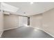 Spacious basement with carpeting and white closets ready for customization at 1110 Butternut Dr, Columbus, IN 47201