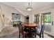 Cozy dining area adjacent to the living room with access to the outdoor deck at 1110 Butternut Dr, Columbus, IN 47201