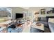 Cozy living room featuring large windows, hardwood floors, and comfortable seating at 1110 Butternut Dr, Columbus, IN 47201