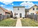 Spacious backyard featuring a stone patio, outdoor seating, and a well-maintained lawn at 1111 Fletcher Ave, Indianapolis, IN 46203