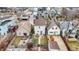Backyard view, featuring patio, fenced yard, and charming landscaping, perfect for outdoor enjoyment at 1111 Fletcher Ave, Indianapolis, IN 46203