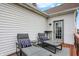 Comfortable deck with lounge chairs and pillows, perfect for relaxing and enjoying the outdoors at 1111 Fletcher Ave, Indianapolis, IN 46203