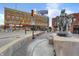 Street view of an intersection with buildings and a statue on the corner at 1111 Fletcher Ave, Indianapolis, IN 46203