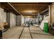 Spacious unfinished basement with exposed ceiling beams, concrete walls, and potential for customization at 11686 Belle Plaine Blvd, Fishers, IN 46037