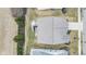 An aerial view showing the roof, deck, and surrounding landscaping of the property at 12610 Broadmoor N Ct, Fishers, IN 46037