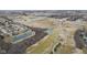 Areal view of the community showing surrounding homes, ponds, and green spaces at 12610 Broadmoor N Ct, Fishers, IN 46037
