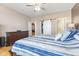 Comfortable bedroom with hardwood floors and closet at 12610 Broadmoor N Ct, Fishers, IN 46037