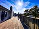 Wide, wooden deck with a lovely view of the backyard at 12930 River Grove Dr, Columbus, IN 47203