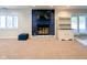 Finished basement featuring a stone fireplace and ample space for various activities at 12930 River Grove Dr, Columbus, IN 47203