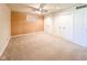 Spacious bedroom with carpet, ceiling fan, and closet doors at 12930 River Grove Dr, Columbus, IN 47203