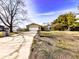 Charming home with a front yard and paved driveway at 12930 River Grove Dr, Columbus, IN 47203