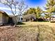Well maintained front yard with mature trees at 12930 River Grove Dr, Columbus, IN 47203