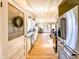 Spacious kitchen with stainless steel appliances, white cabinets, and view to the backyard at 12930 River Grove Dr, Columbus, IN 47203