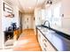Bright kitchen with stainless steel appliances, and black countertops at 12930 River Grove Dr, Columbus, IN 47203