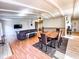 Open concept living and dining room area with vaulted ceilings and a stone fireplace at 12930 River Grove Dr, Columbus, IN 47203