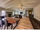 Spacious open floor plan with kitchen, dining area, living area and stone fireplace at 12930 River Grove Dr, Columbus, IN 47203