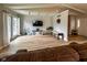 Bright living room featuring a TV, wood floors, bench and glass patio doors at 12930 River Grove Dr, Columbus, IN 47203