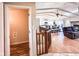 View into the home's open concept with the living room, kitchen, dining and hallway visible at 12930 River Grove Dr, Columbus, IN 47203