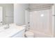 Bright bathroom featuring a white vanity with a large mirror and a shower-tub combination at 12974 Pettigru Dr, Carmel, IN 46032