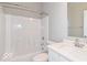 Bright bathroom with a white vanity, toilet, and shower-tub combination at 12974 Pettigru Dr, Carmel, IN 46032