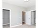 Well-lit bedroom includes a walk-in closet and ample storage space for a clutter-free environment at 12974 Pettigru Dr, Carmel, IN 46032