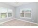 Comfortable bedroom featuring expansive windows and neutral colors enhancing natural light and calm at 12974 Pettigru Dr, Carmel, IN 46032