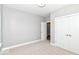 Neutral bedroom includes closet storage and a bright window creating a comfortable retreat at 12974 Pettigru Dr, Carmel, IN 46032
