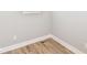 Neutral corner with wood floor and white base trim at 12974 Pettigru Dr, Carmel, IN 46032