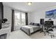 This room features an inviting bed, a large window, and a workspace at 13071 Pennington Rd, Fishers, IN 46037