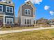 Inviting two-story home featuring a well-kept lawn, appealing architecture, and a welcoming neighborhood at 13071 Pennington Rd, Fishers, IN 46037