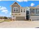 Charming two-story home featuring a two-car garage, neutral paint, and landscaping at 13071 Pennington Rd, Fishers, IN 46037