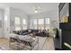 Bright living room with stylish decor, a comfortable sofa, and a fireplace at 13071 Pennington Rd, Fishers, IN 46037