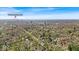 Aerial image shows a neighborhood close to Downtown Indianapolis and many mature trees at 140 E 44Th St, Indianapolis, IN 46205