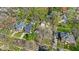 Overhead image features well-maintained homes in the neighborhood, mature trees, and green spaces at 140 E 44Th St, Indianapolis, IN 46205