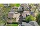 Aerial view showcases a charming home with landscaped yard, inviting outdoor spaces, and a well-maintained exterior at 140 E 44Th St, Indianapolis, IN 46205