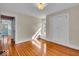 Bedroom featuring hardwood floors, a closet, and window with bench at 140 E 44Th St, Indianapolis, IN 46205