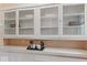 Vintage built-in cabinets provide ample storage with display space, enhancing the home's character at 140 E 44Th St, Indianapolis, IN 46205
