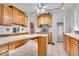 Kitchen featuring tile floors, wood cabinets, and a breakfast nook at 140 E 44Th St, Indianapolis, IN 46205